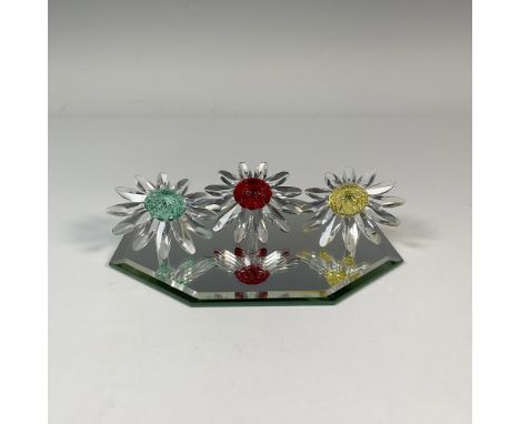 This beautiful group presents clear crystal petals and stems with red, green and yellow centers. Accompanied by an hexagonal 