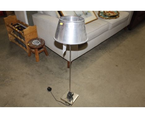 A table lamp with metal shade