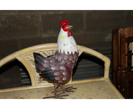 A metal model of  a chicken 