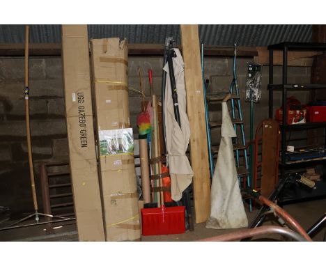 A garden parasol AF; a bundle of garden tools; fishing rods etc.