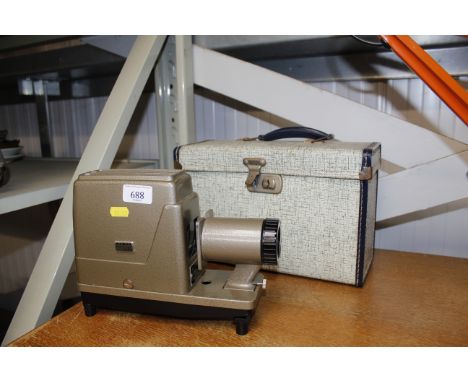 An Argos 300 Compact slide projector with original case 