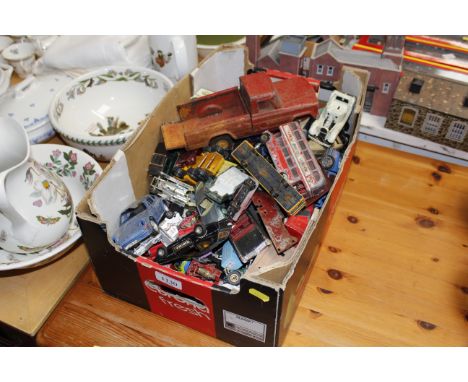 A box of mostly play worn die cast and tin plate toy model vehicles