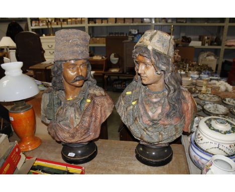 Two terracotta Goldscheider style busts of a Russian man and woman, height approx. 69cms