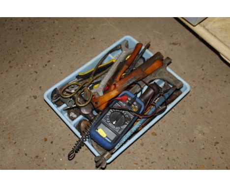 A box of various hand tools