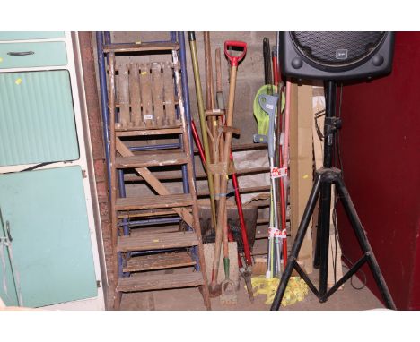A quantity of garden tools to  include spade, rake etc.