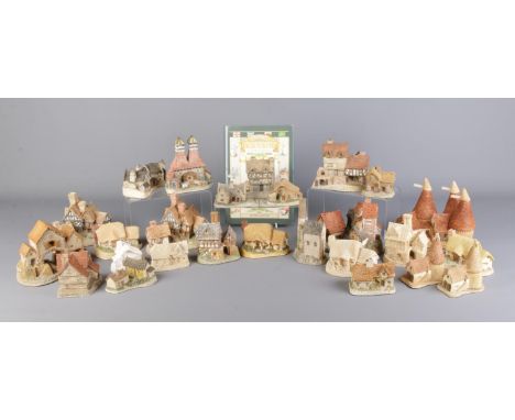 A collection of unboxed David Winter cottages, together with 'Collecting David Winter Cottages' guide book, by John Hine. Inc