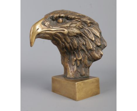 A cast bronze sculpture, modelled as an eagle's head. Height 21cm.