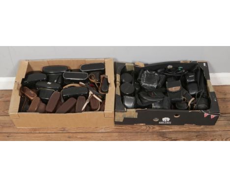 Two boxes of various 35mm camera cases, examples from Olympus, Chinon, Canon, Zenit, Pentax, Ilford and soft lens case etc.