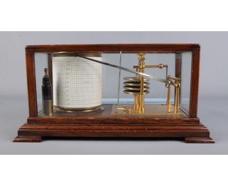 Tycos Short &amp; Mason oak and glass cased barograph complete with ink bottle and pack of Casella recording paper.