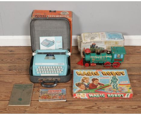 A collection of assorted items, to include Mettoy Playcraft Petite Typewriter, Marx battery operated Whistling Locomotive and