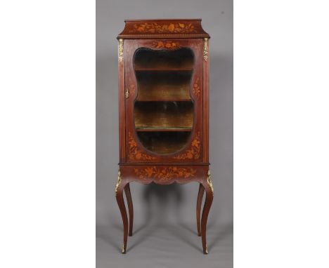 A late 19th/early 20th century mahogany vitrine cabinet. With marquetry inlaid decoration, raised on cabriole supports and ha