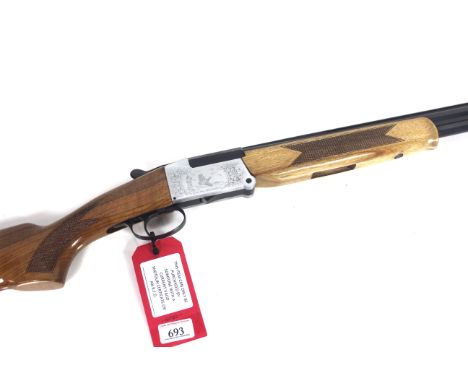 A 28 bore over and under shotgun by Investarms with 28" barrels having excellent bores, stock missing butt pad / plate Ser. N