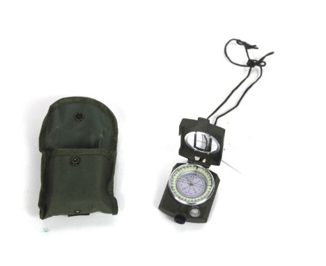 A modern military style compass within case