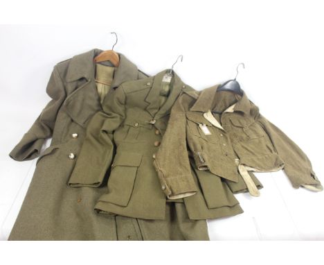 A WWII 1940 Patt battle dress blouse with R.A. Officer service jacket and trousers; also include an Officers trench coat