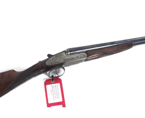 A Zabala 12 bore S.L.E. 26" barrel choked Imp. & ½, 70mm chamber (steel shot compatible) auto safe and articulated front trig