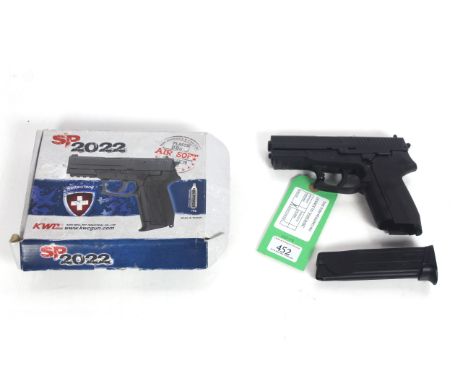 A K.W.C. Co2 air pistol (boxed) NB magazine catch AF.As a post 1939 air weapon the restrictions of the crime Reduction Act ap