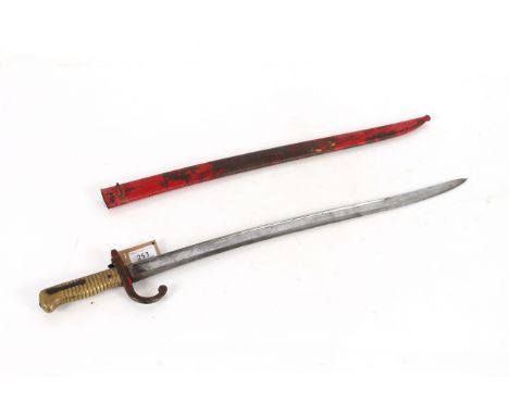 A French model 1866 brass hilted sabre bayonet with scabbard, blade dated 1874 with scabbard AF