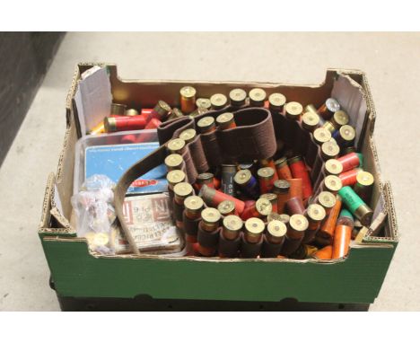 A box of various cartridges, many collectors examples included, and a canvas belt containing 25 paper Eley Grand Prix No.5 ca