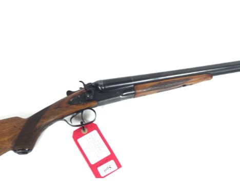 A 12 bore hammer side-by-side shotgun with 28¼" barrels by Baikal Ser. No. K-20295 This item can only be purchased by someone