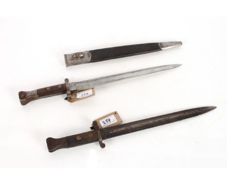 A British model 1888 MkI 2nd type bayonet with MkI scabbard, blade marked 4/95 Sanderson, also pommel unit marked 2.E.Y.149. 