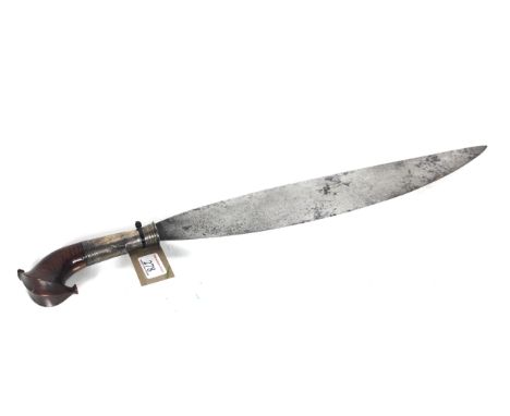 A traditional 19th Century Moro Barong sword with white metal embellishment to grip, blade approx. 16" long x 2&frac12;" wide