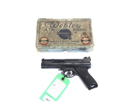 A post war Webley & Scott MkI .177 Cal. air pistol with original box and contents. As a post 1939 air weapon the restrictions