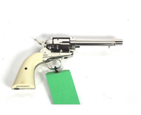 A Colt SAA .45 nickel and pearl single action Army .177 Co2 air pistol in overall excellent condition.As a post 1939 air weap