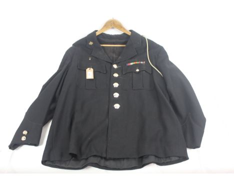 A military style jacket with insignia for the United Services Corps