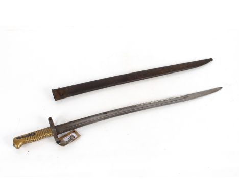 A brass hilted sabre bayonet for The Remington Rolling block rifle, with scabbard