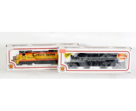 BACHMANN HO SCALE MINT AND BOXED NEW YORK CENTRAL DIESEL FT A-UNIT in black and grey livery and DITTO C&O CHESSIE SYSTEM B23/