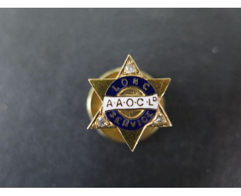 An 18ct yellow gold enamel and diamond Long Service pin for A.A.O.C Ld to H Midson Novr 1912 - weight approx 3.7 grams