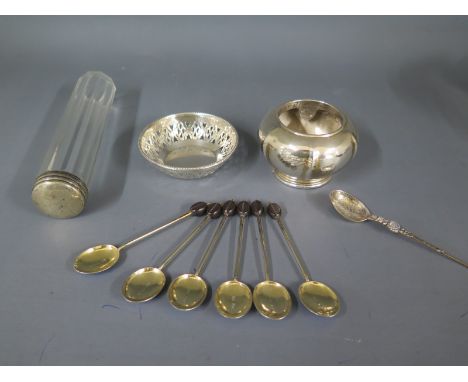 A silver pierced dish, a silver lighter case, a silver spoon and six silver and enamel coffee spoons and a silver top bottle 
