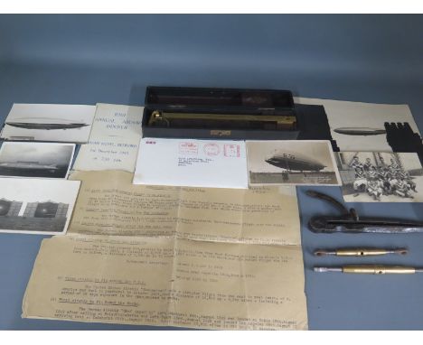 Airship related postcards - R100, R101, R33, football team - ephemera and instruments including 1918 compasses and cased plan