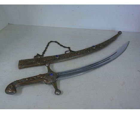 An Eastern sword with brass scabbard hand guard and grip - Overall length 69cm