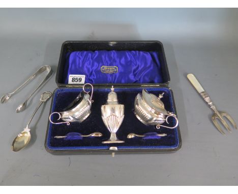 A silver three piece cruet Birmingham 1903/04 - weight approx 3.8 troy oz - boxed, good condition with a silver spoon, nip an