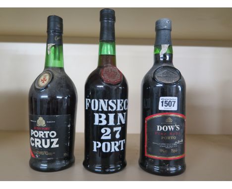 A bottle of Dows fine ruby port, a bottle of Fonseca Bin 27 port and a bottle of port Cruz ruby port
