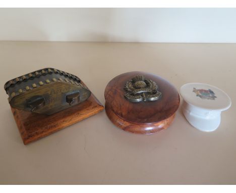 A World War I trench Art British tank inscribed souvenir, France on one side and Arras 1918 on the other, together with a sma