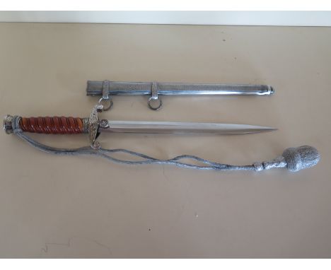 An original German World War II Army Officers dagger stamped "Tiger Soligen" excellent blade and grip, metal parts plate lift