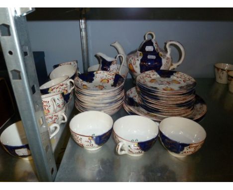 A 42 PIECE MID NINETEENTH CENTURY 'GAUDY WELSH' PORCELAIN TEA SERVICE 