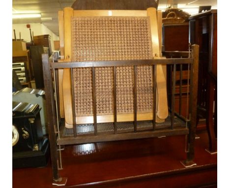 DOLL'S DROPSIDE COT, A CHEVAL GRATE SCREEN AND A BEECH WOOD AND CANE PANEL ADJUSTABLE BACK REST WITH ARMS (3) 