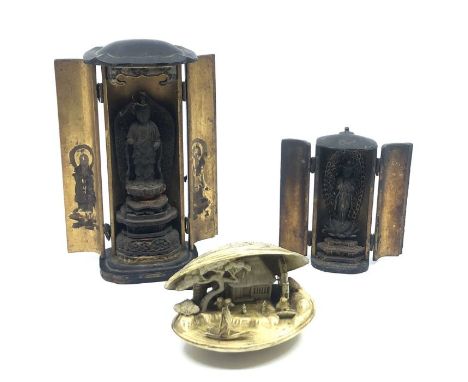 Two oriental portable buddhas, together with a plastic faux shell netsuke (3)