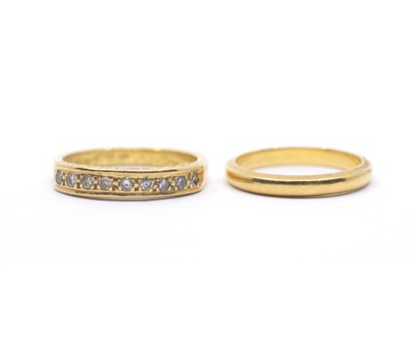 A 22ct yellow gold wedding band, 3.4g and a yellow gold diamond half hoop ring, set nine lightened diamonds, 4.8g