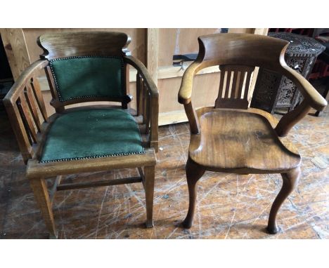 Two early 20th century oak captains chairs, one with an upholstered back (Damaged and in need of repair A/F), the arms with c