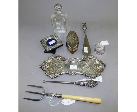 A facetted glass flask and cover, London 1904, another slender tapering example with plain silver collar, a square silver pho