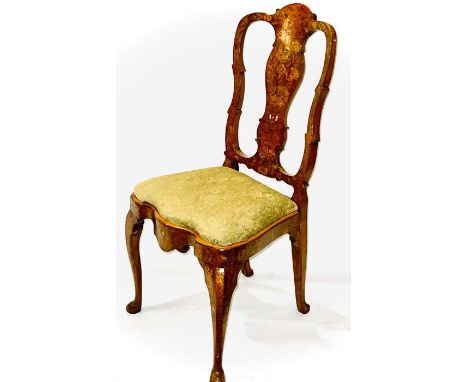 A Queen Anne walnut and marquetry side chair, circa 1715, scrolled top rail united with serpentine sides flanked by baluster 