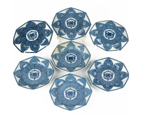 SEVEN CHINESE EXPORT BLUE AND WHITE ARMORIAL OCTAGONAL PLATES MADE FOR THE DUTCH MARKET (7)Qianlong Each painted in the centr