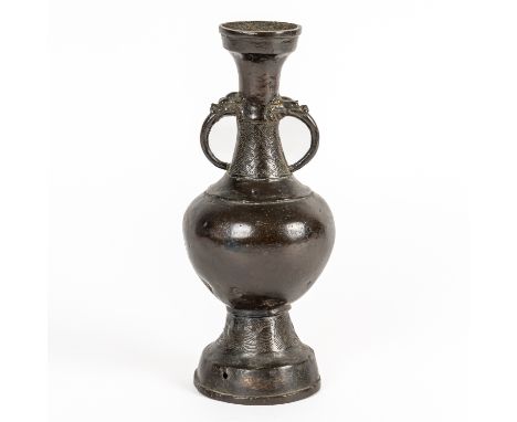 A CHINESE BRONZE VASEProbably Yuan/Ming dynasty Of pear form with a waisted neck decorated with a band of leiwen flanked by t