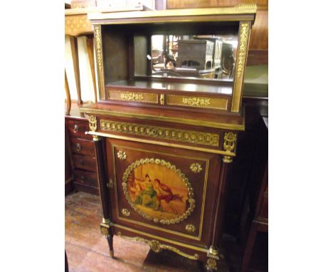 A late 19th century French side cabinet, the lower section enclosed by a single panelled door flanked by two reeded column su