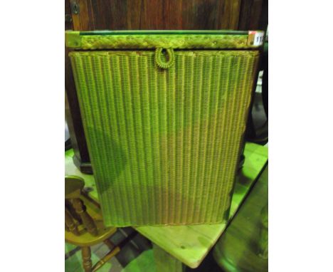 A vintage Lloyd Loom Lusty linen basket of rectangular form with plate glass top and in original gold colourway 