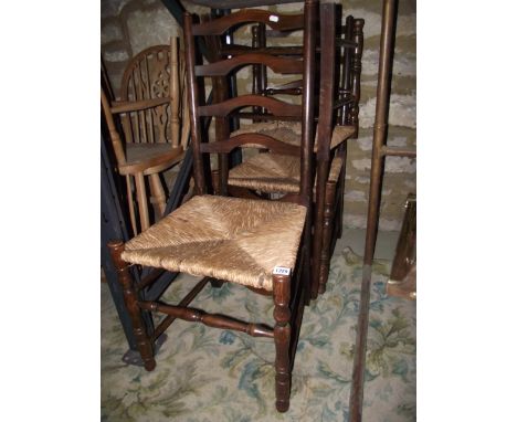Miscellaneous chairs including three ladderback chairs with rush seats, oak framed elbow chair, stool, etc